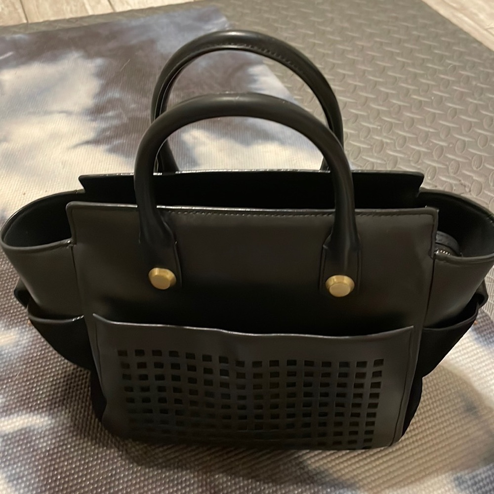 Reed Krakoff hand bag.